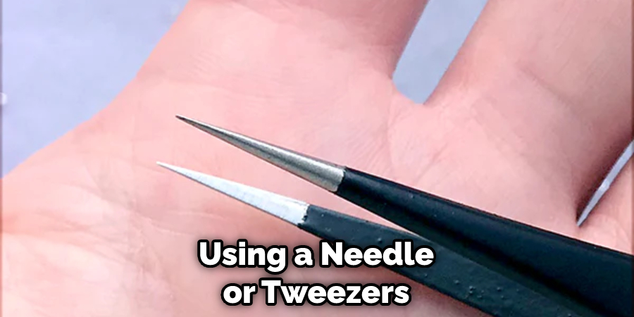 Using a Needle or Tweezers