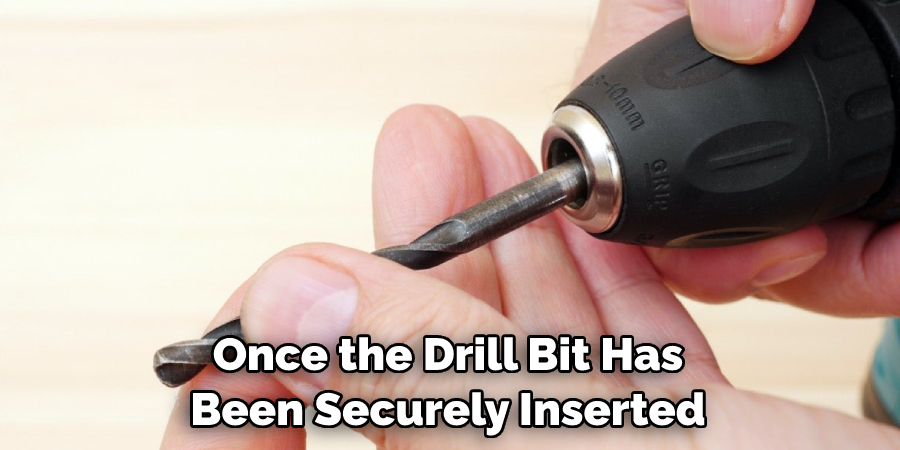 Once the Drill Bit Has Been Securely Inserted