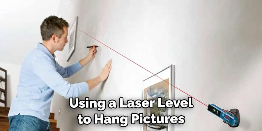 Using a Laser Level to Hang Pictures