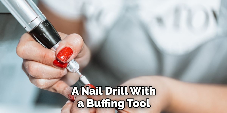 A Nail Drill With a Buffing Tool