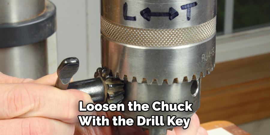 Loosen the Chuck With the Drill Key 