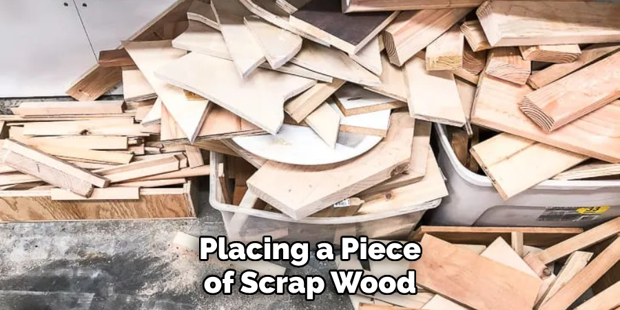 Placing a Piece of Scrap Wood