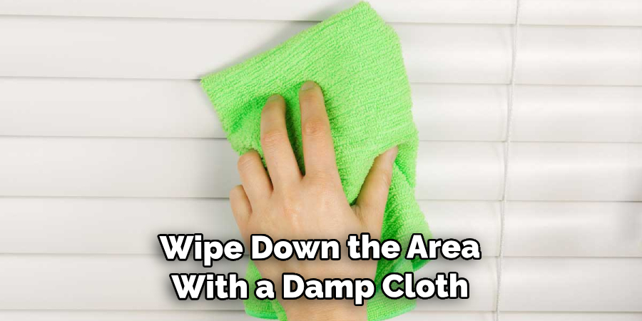 Wipe Down the Area With a Damp Cloth