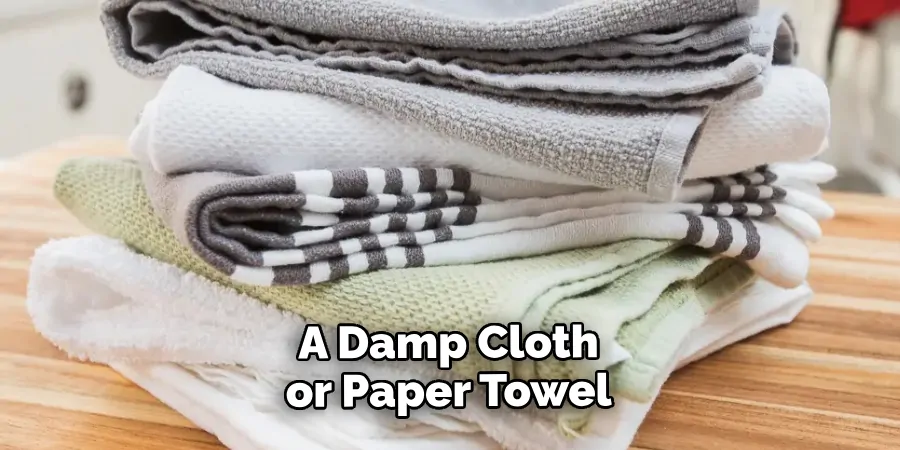 A Damp Cloth or Paper Towel