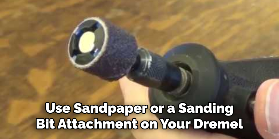 Use Sandpaper or a Sanding Bit Attachment on Your Dremel