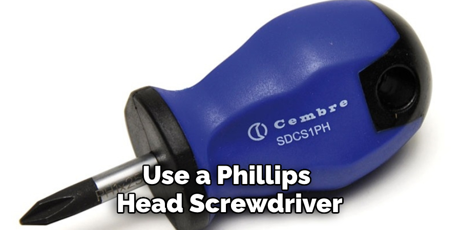 Use a Phillips Head Screwdriver